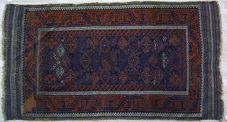 Turkoman throw rug, ca. 1900, with repeating medal