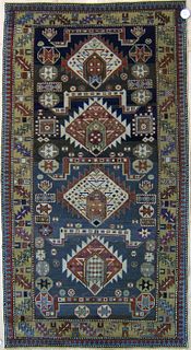 Shirvan throw rug, ca. 1900, with 4 medallions and