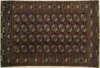 Turkoman throw rug, ca. 1910, with repeating medal