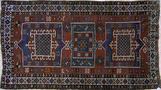 Karchopf Kazak throw rug, ca. 1915, with 3 central