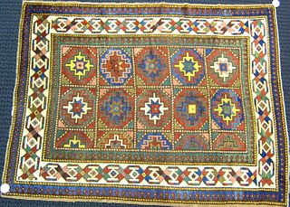 Moghan Kazak throw rug, ca. 1900, with repeating m