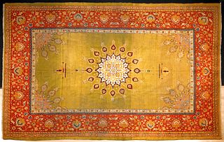 Roomsize Agra rug, ca. 1920, with central ivory me