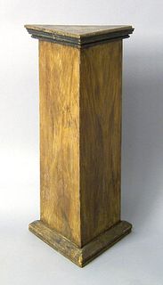 Triangular wooden pedestal, late 19th c., with a g