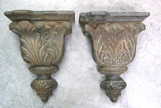 Pair of cast iron hanging wall brackets, late 19th