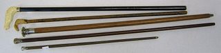 Group of 5 carved canes, late 19th/20th c., two wi