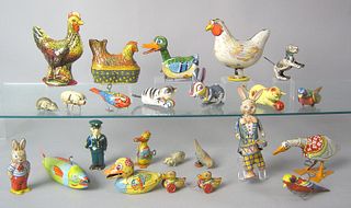 Twenty-two painted tin animal toys, early/mid 20th