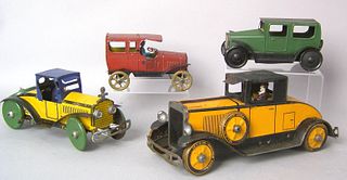 Four painted tin cars, 1920's/1930's to include "M