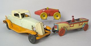 Three painted tin automotive toys, 1920's/1930's t