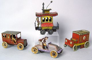 Four painted tin vehicles, 1930's to include "Toon