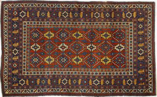Shirvan throw rug, ca. 1910, with overall floral d