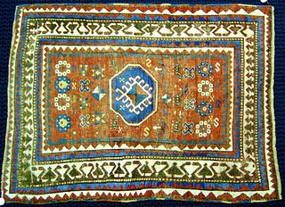 Kazak throw rug, ca. 1910, with red field and sawt