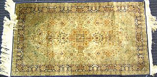 Qum mat, ca. 1950, with overall floral design on a