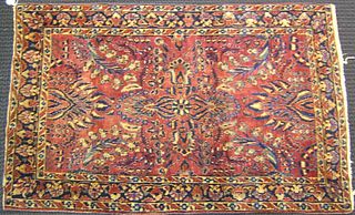 Sarouk throw rug, ca. 1920, with overall floral de