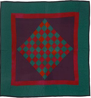 Amish pieced crib quilt, mid 20th c., with a diamo