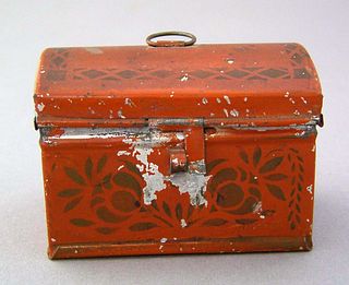 Red toleware trinket box, 19th c., with stenciledl