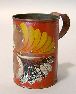 Red toleware mug, 19th c., with fruit decoration,