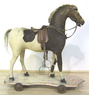 Child size pull toy horse, ca. 1900, with leathera
