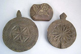 Three carved oak pastry stamps, 19th c., two withi