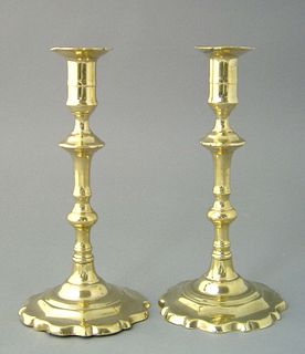 Pair of Queen Anne brass candlesticks, mid 18th c.