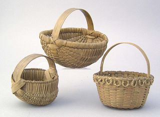 Three miniature woven splint handled baskets, 19th