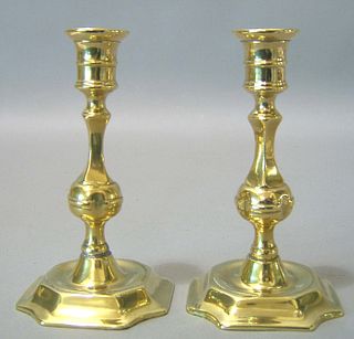 Pair of Queen Anne brass candlesticks, early 18th.