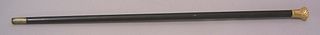 Ebonized and gold-tipped cane, mid 19th c., inscri