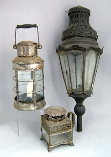 Three tin lanterns, 19th c., the largest with pier