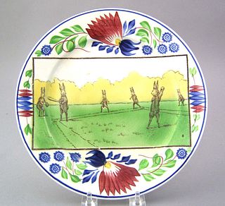 Stick spatter plate, 19th c., with rabbits playing