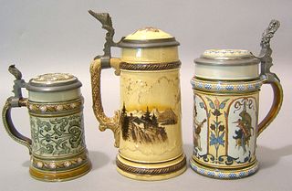 Three Mettlach steins, ca. 1900, two with etched d