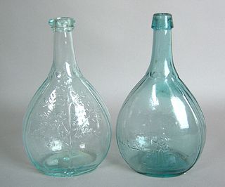 Two blown aqua glass bottles, 19th c., 9 1/4" h.