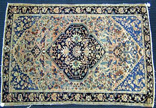 Sarouk throw rug, ca. 1930, with large central med