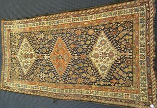 Kashgai long rug, ca. 1900, with 3 central medalli
