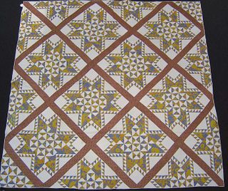 Pieced quilt, ca. 1870, with feathered star patter