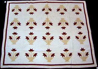 Pieced quilt, late 19th c., with potted flower dec