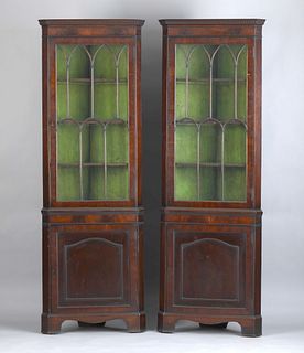 Pair of Regency mahogany corner cupboards, ca. 179