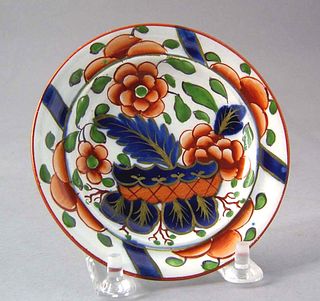 Gaudy Dutch cup plate in the warbonnet pattern, 4/