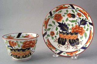 Gaudy Dutch cup and saucer in the warbonnet patter