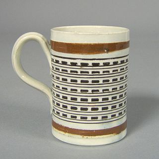 Mocha child's mug, 19th c., with brown and black b