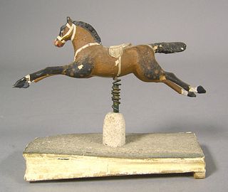Running horse squeak toy, 19th c., with polychrome