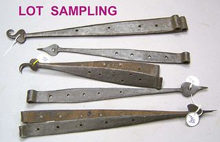 Nine pairs of New England wrought iron strap hinge