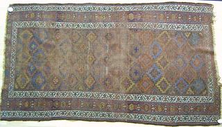 Three oriental throw rugs.