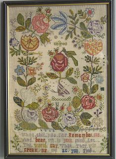 Needlework sampler, 20th c., with floral decoratio