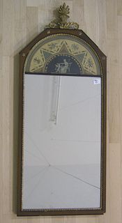Two carved giltwood and mahogany mirrors, 20th c.