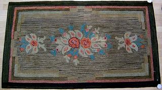 Two American hooked rugs with floral decoration, 6