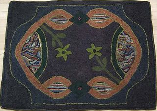 Three American hooked rugs with floral decoration,