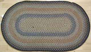 Four braided oval mats, 20th c., 63" x 28 1/2", 47