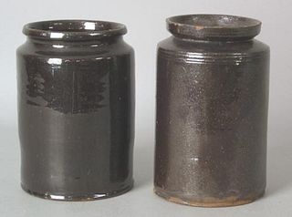 Two similar redware crocks, 19th c., with manganes