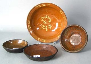 Four pcs. of redware, 19th c., to include 2 pie pl