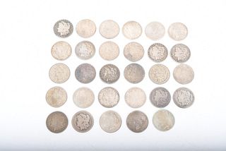 A Group of Morgan and Silver Peace Dollars 