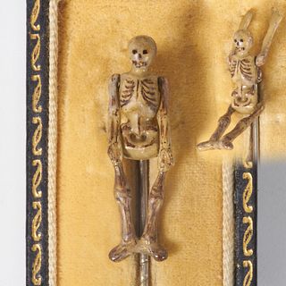 AN UNUSUAL ARTICULATED SKELETON STICK PIN